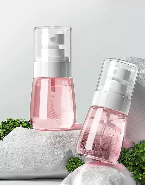 Load image into Gallery viewer, Travel Spray Bottle, Mini Refillable Small Spray Bottles with Fine Mist Nozzle for Hair Face Water Alcohol Plants, 1pcs 30ml
